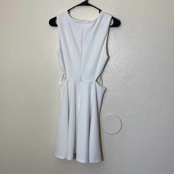 Lulu’s toast to you sleeveless white cut out skater mini dress - Picture 8 of 12